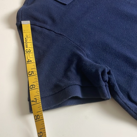 Lacoste Navy Polo- 2-button collar-slit hem-Medium/Large - Picture 10 of 12